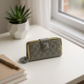 Quilted Studded Clutch Wallet with Pom-Pom Detail